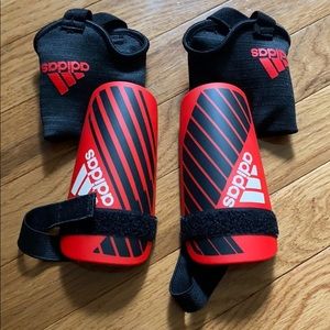 Adidas shin guards in excellent condition